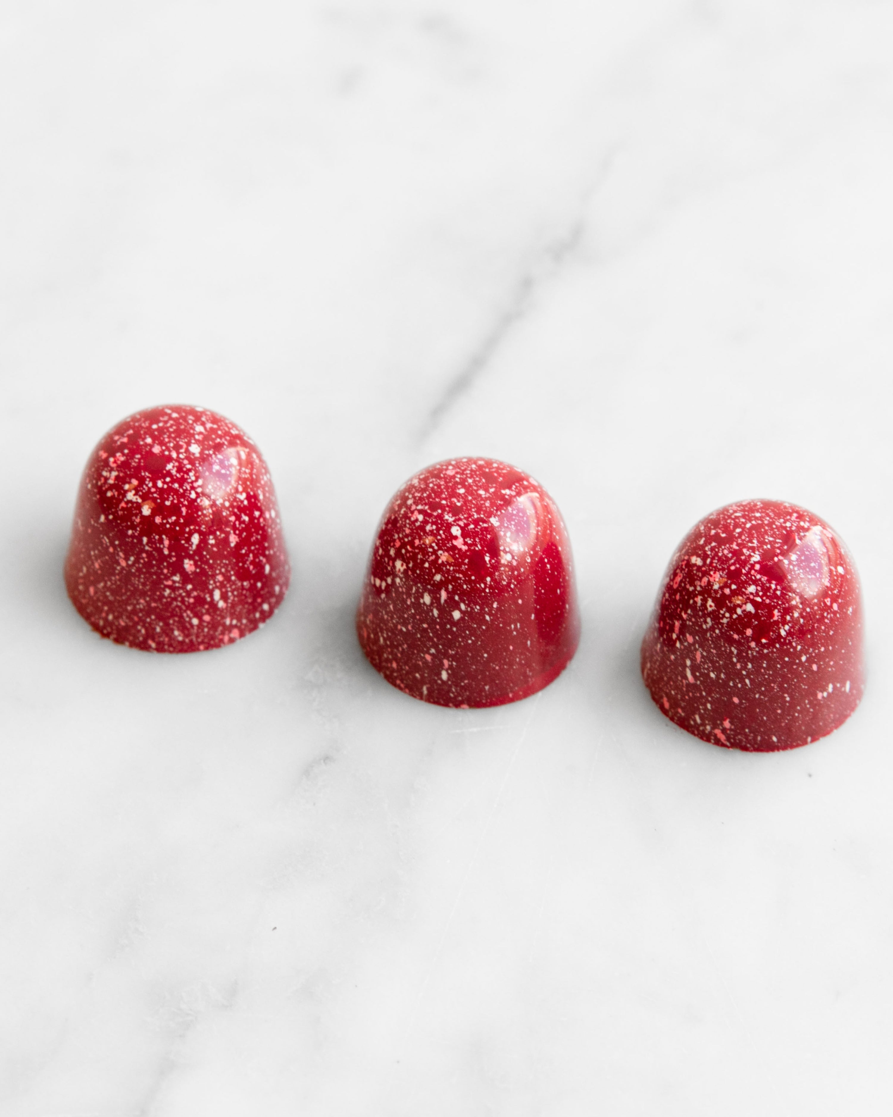 Three Piece Raspberry Creme Dark Chocolate Bonbons
